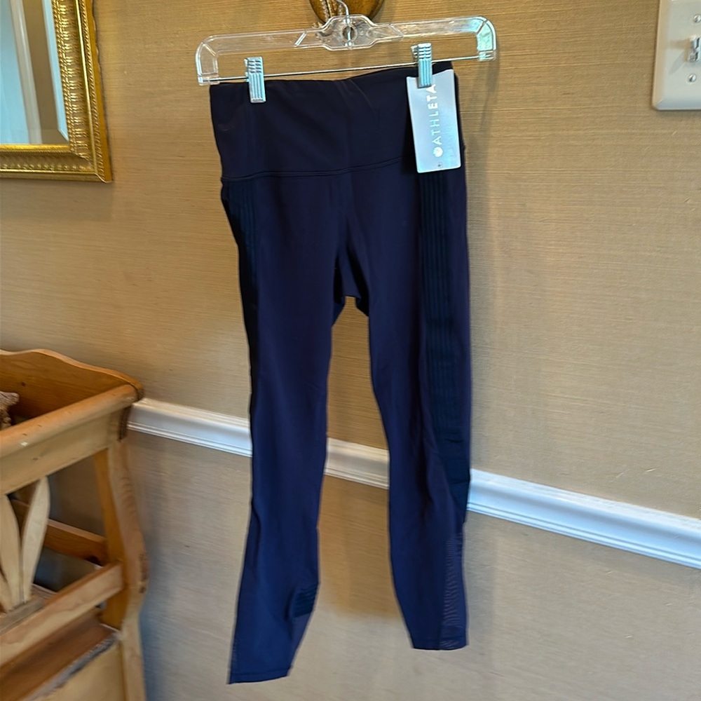 Athleta Capri leggings. Size XS side striped Navy.